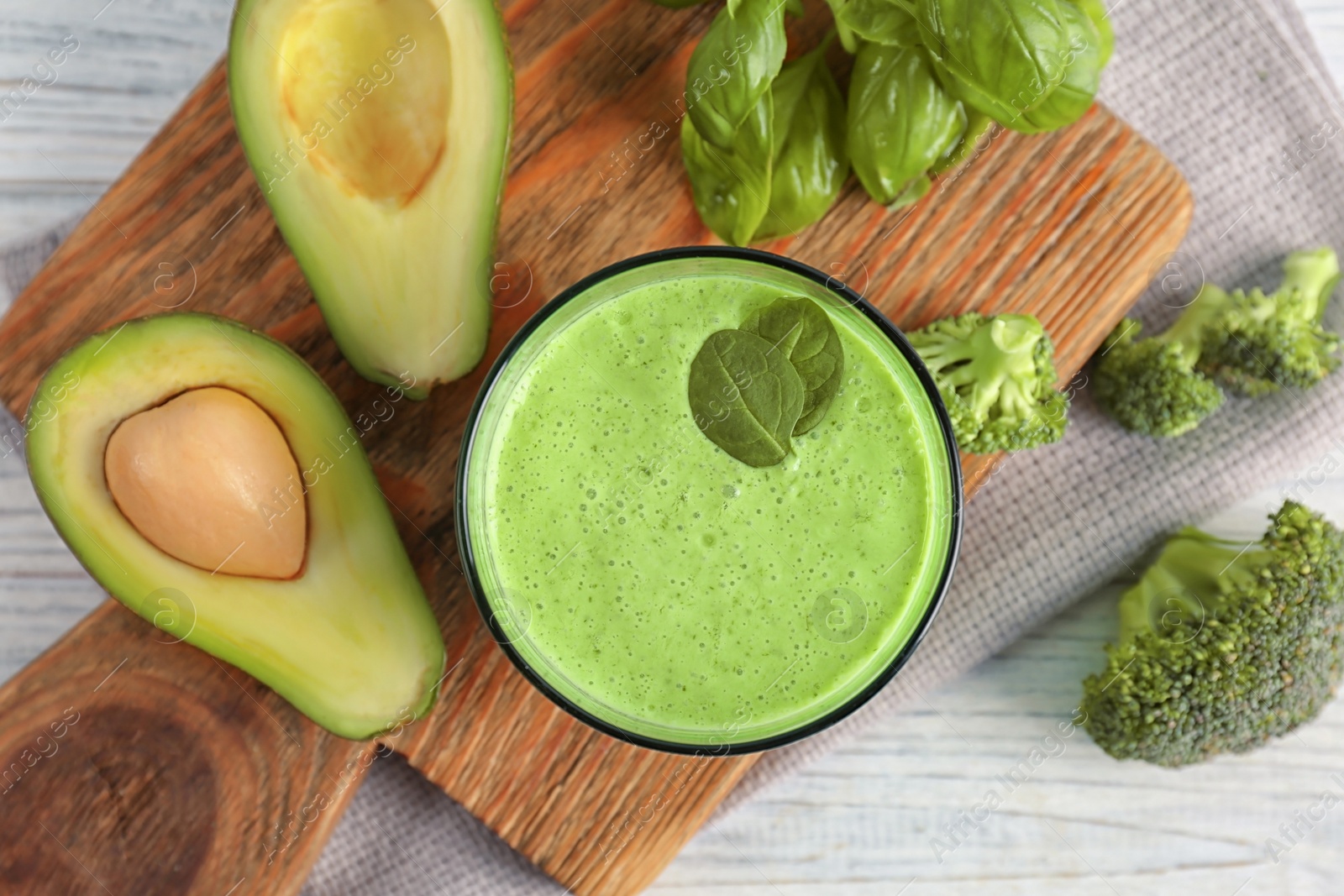 Photo of Flat lay composition with healthy detox smoothie and ingredients on light background