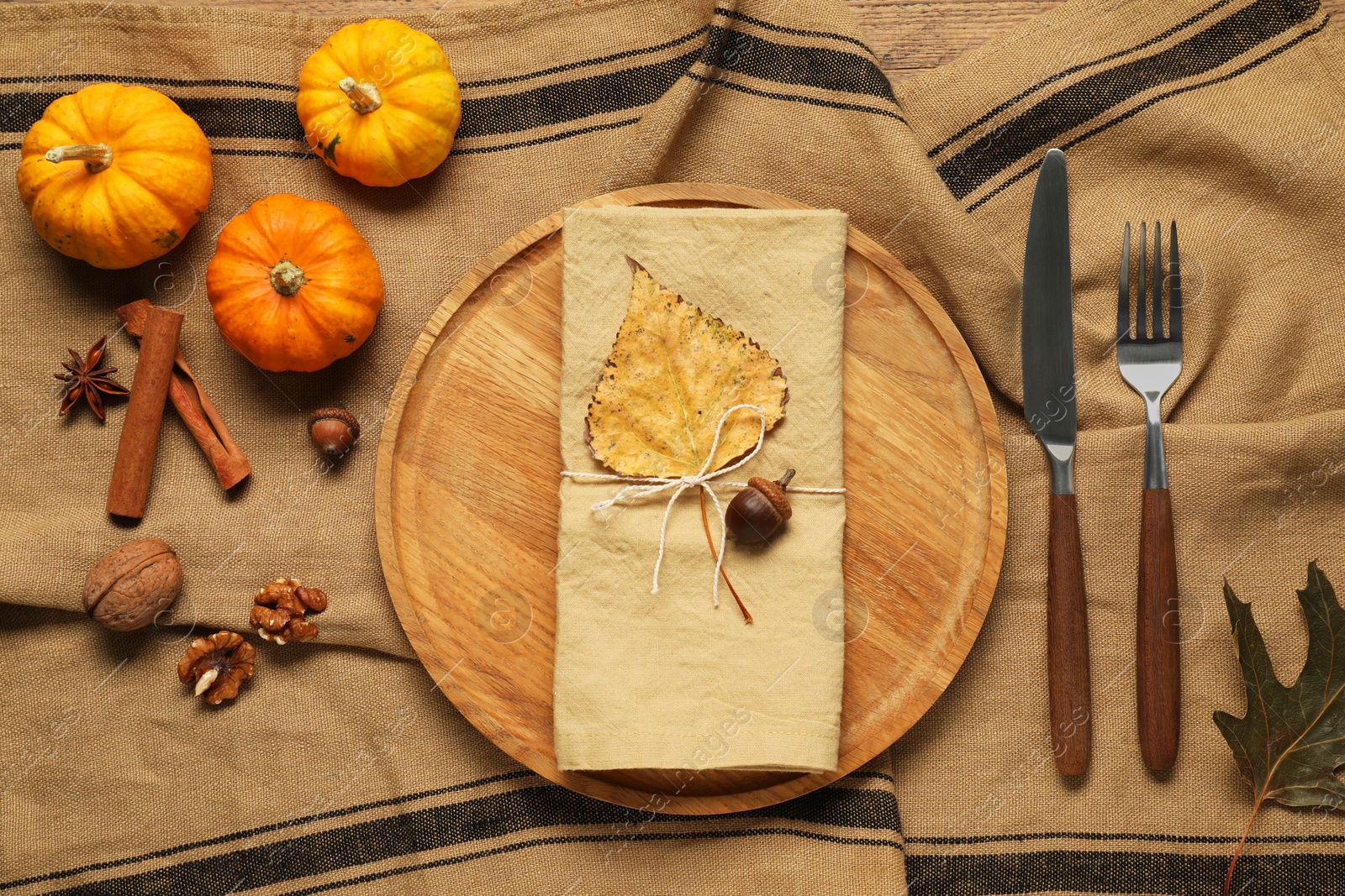 Photo of Stylish autumn table setting on cloth, flat lay