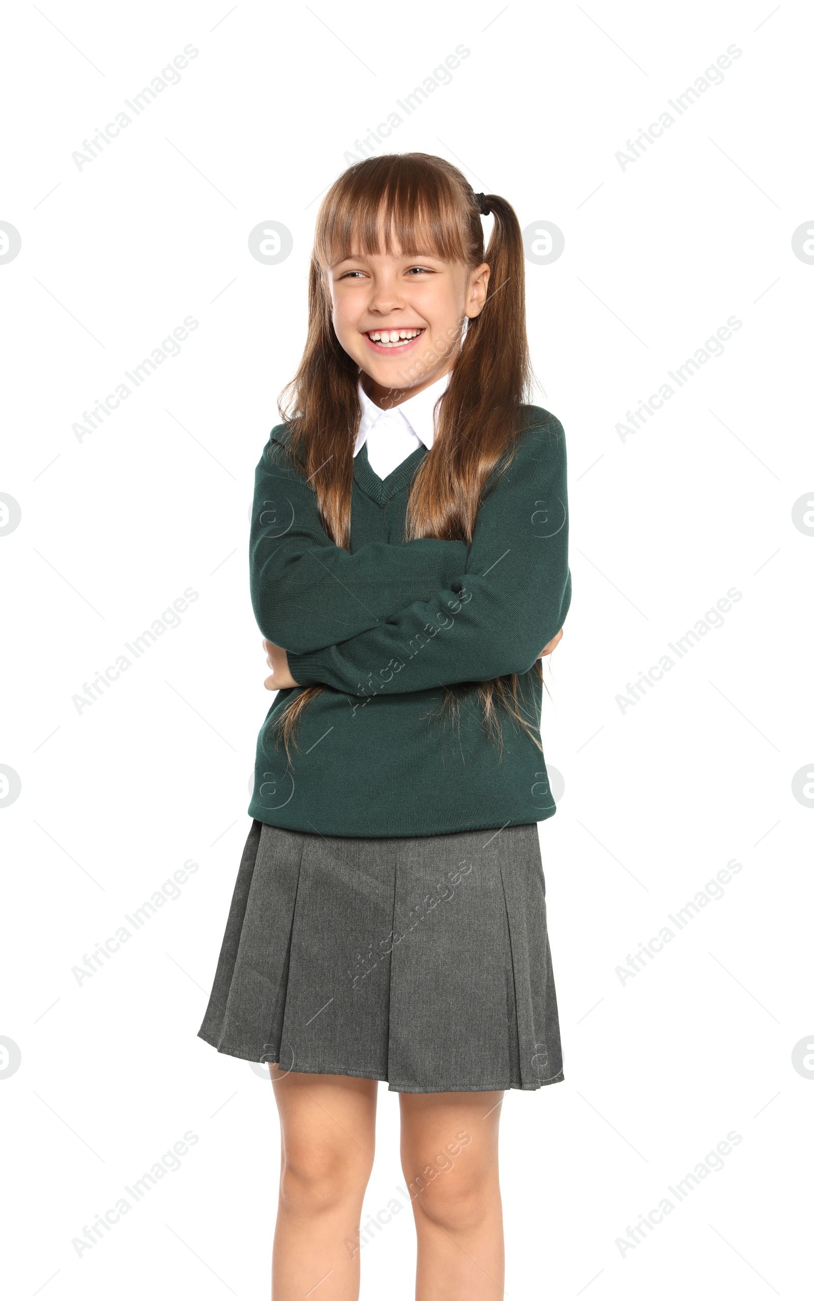 Photo of Little girl in stylish school uniform on white background