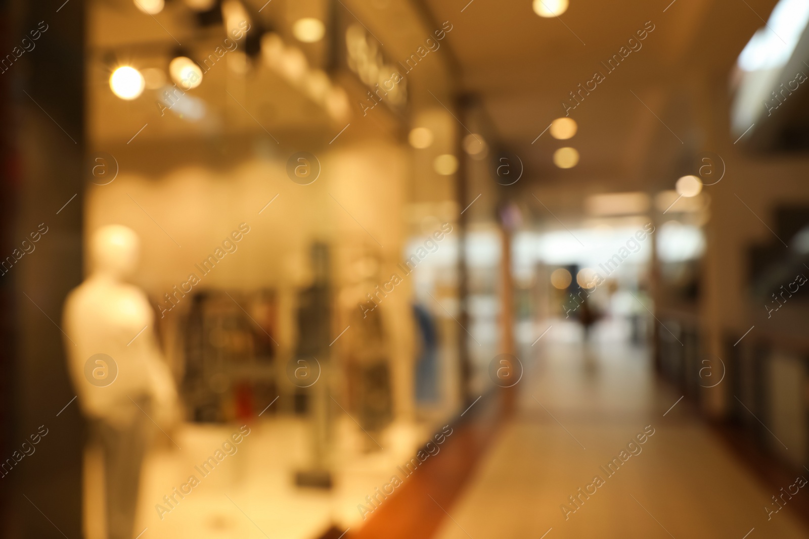 Photo of Blurred view of shopping mall interior. Bokeh effect