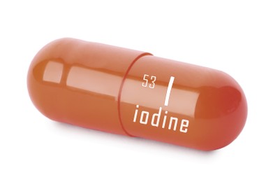 Image of Iodine capsule on white background. Mineral element