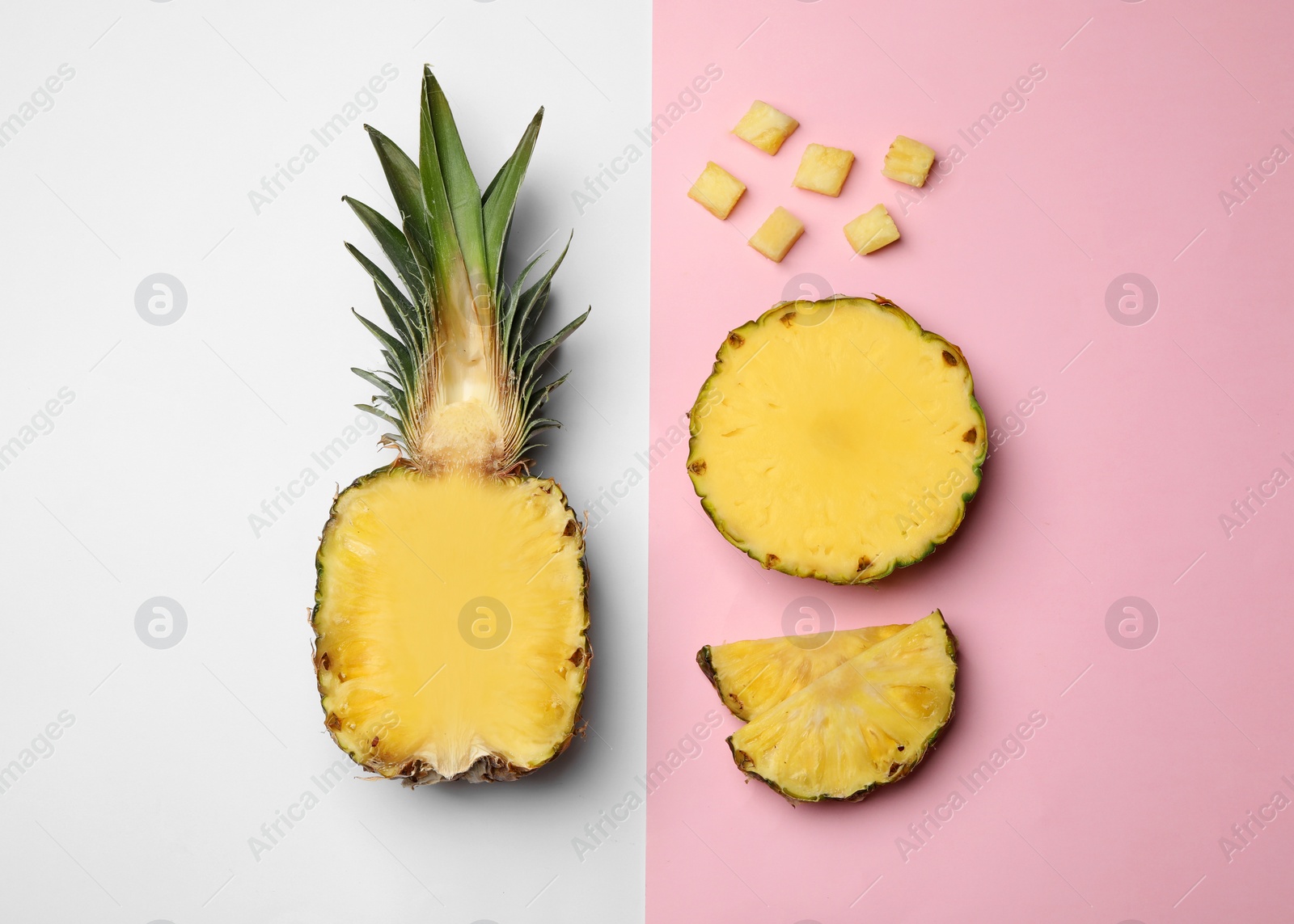 Photo of Flat lay composition with cut and fresh juicy pineapples on color background