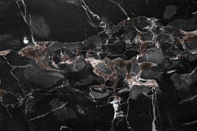 Image of Texture of black marble stone surface as background, closeup