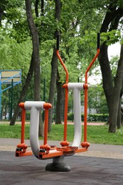 Photo of Empty outdoor gym with ovate stepper in park