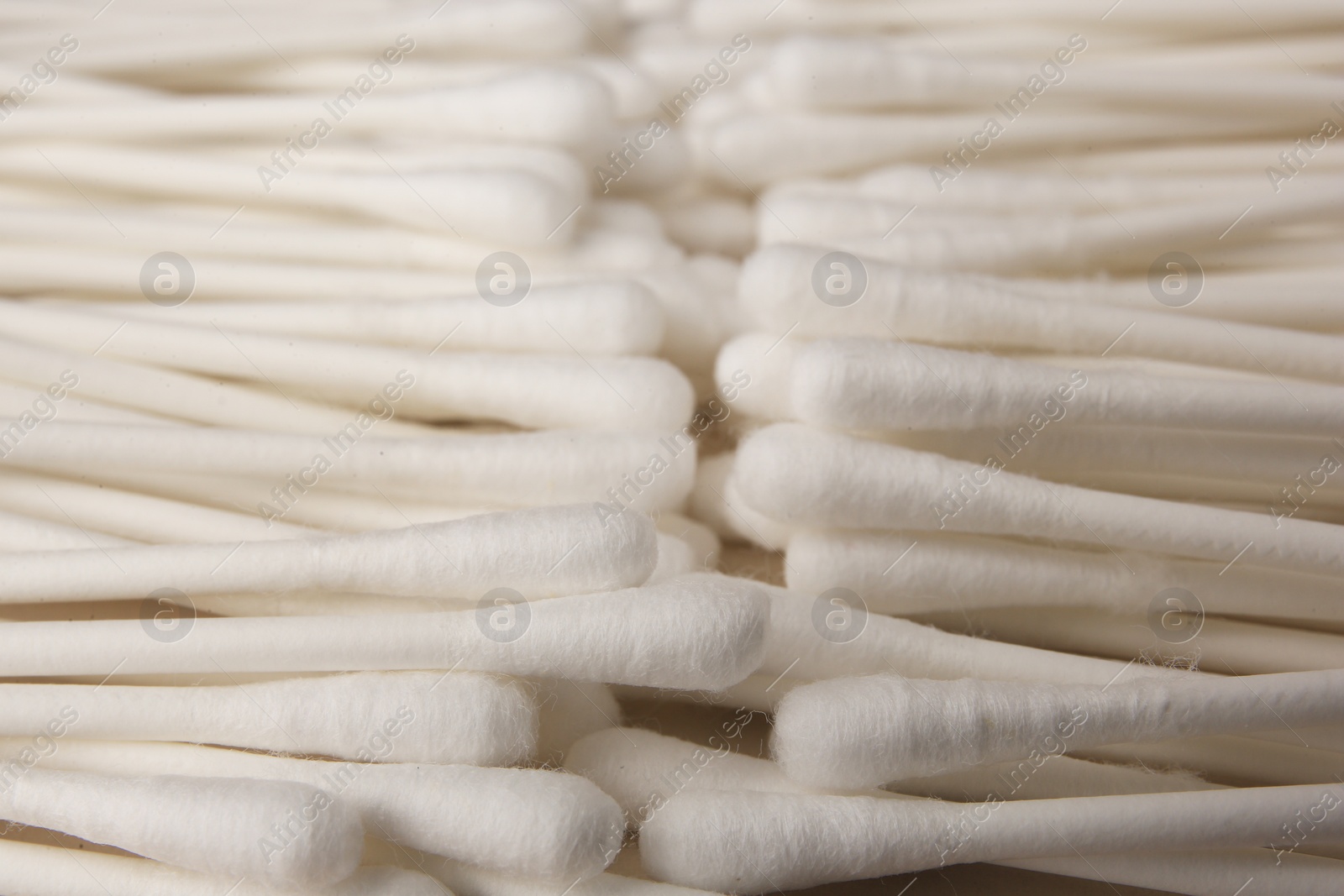 Photo of Many clean cotton buds as background, closeup