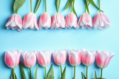 Photo of Beautiful composition with tulips for Mother's Day on color background