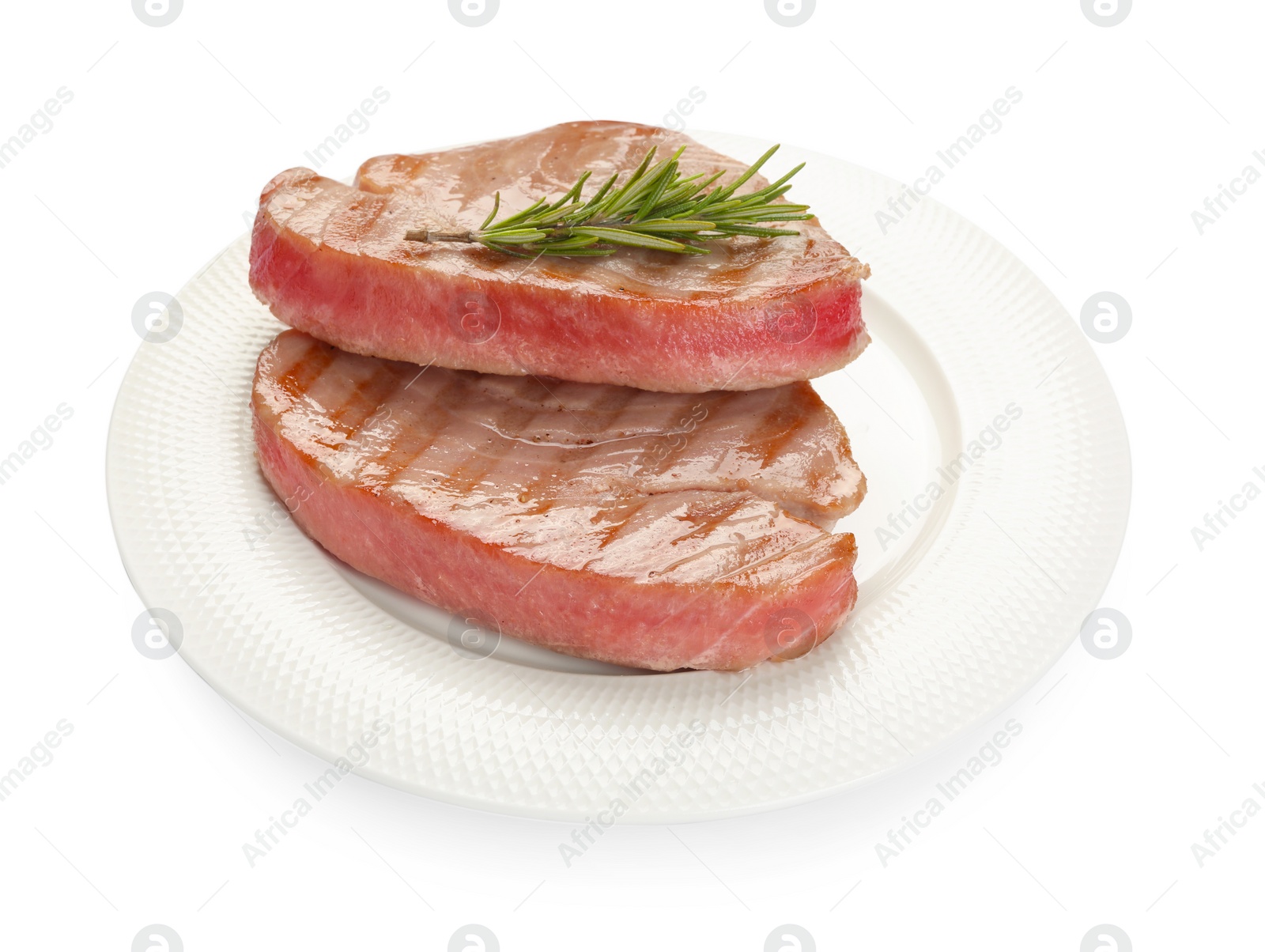 Photo of Delicious tuna steaks with rosemary isolated on white