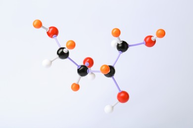 Photo of Molecule of sugar on white background. Chemical model
