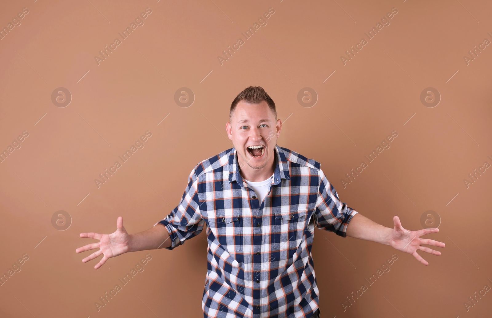 Photo of Portrait of handsome man on color background