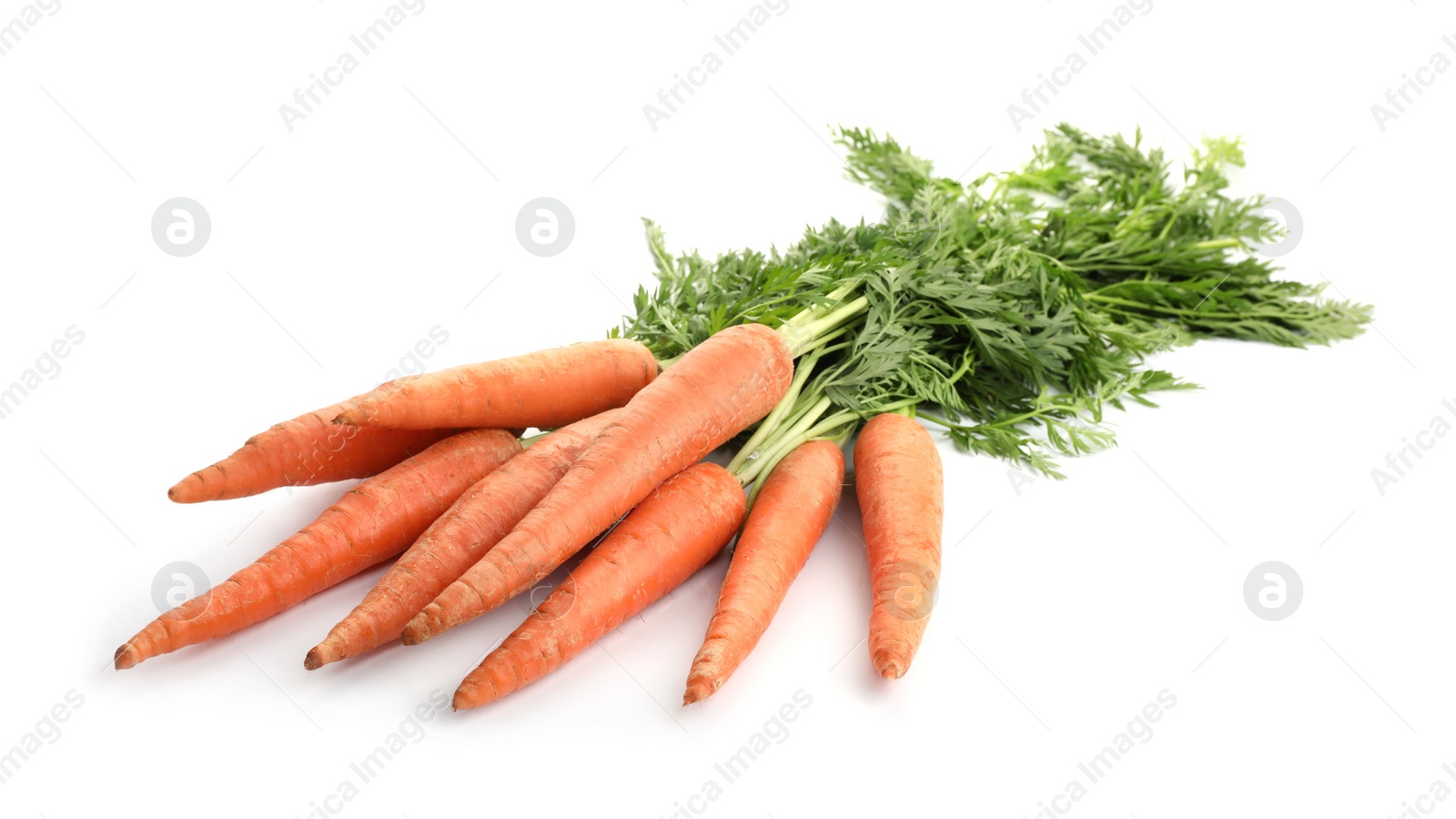 Photo of Fresh ripe carrots on white background. Wholesome vegetable