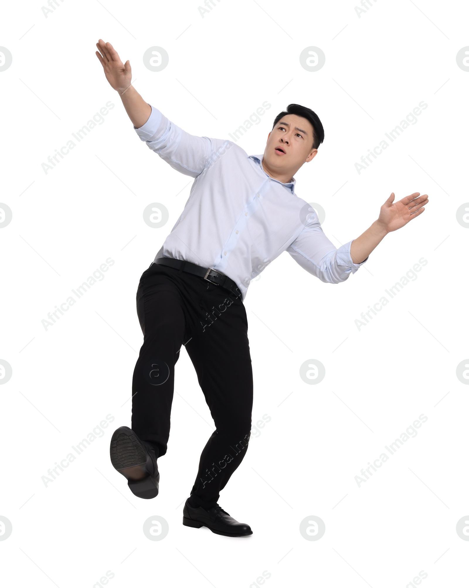 Photo of Businessman in formal clothes posing on white background