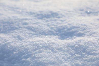 Photo of Beautiful white snow as background, closeup view