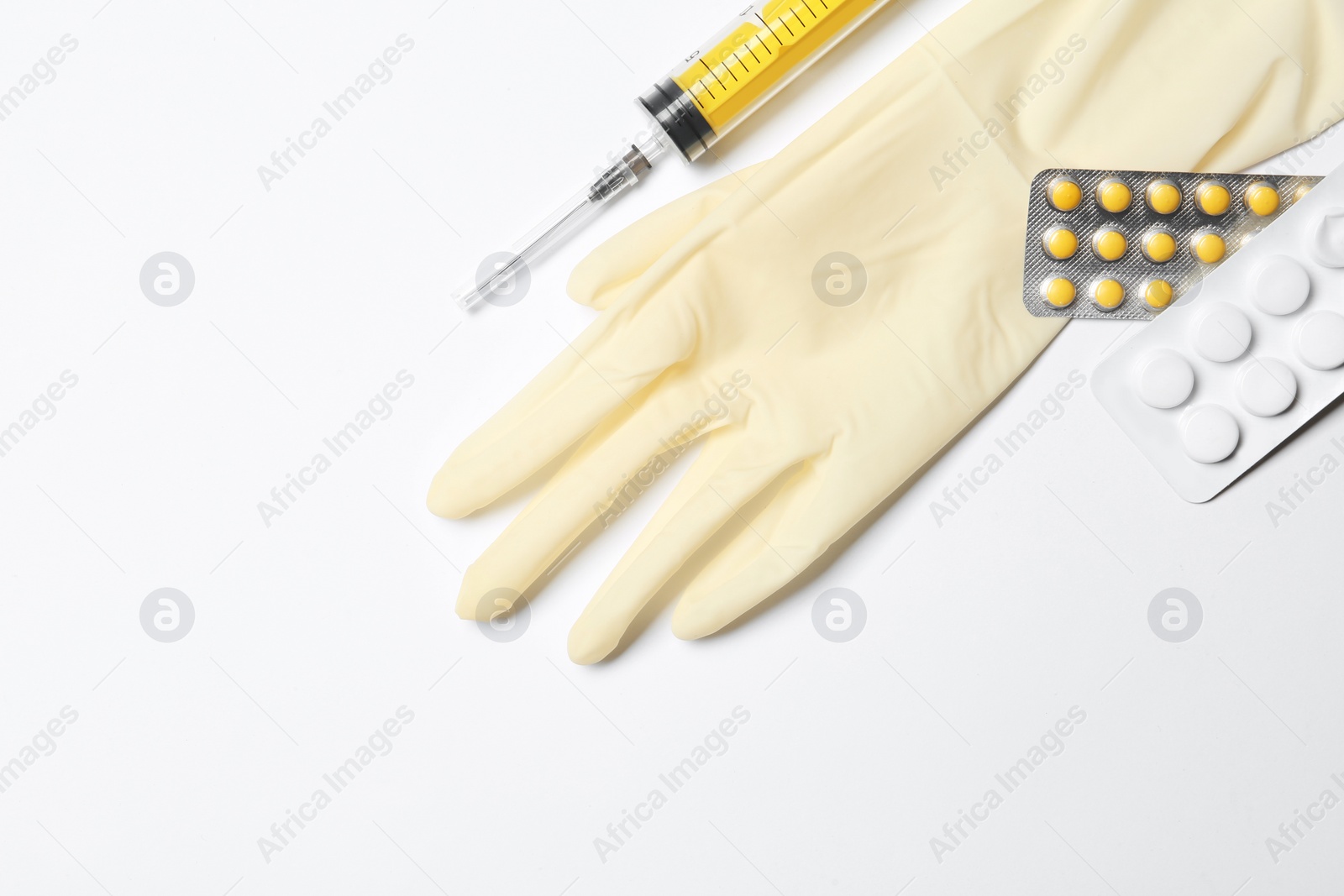 Photo of Flat lay composition with medical glove on white background