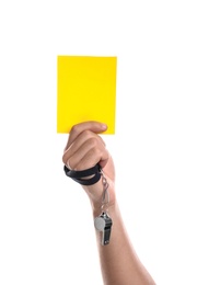 Photo of Football referee with whistle holding yellow card on white background, closeup