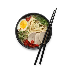 Photo of Delicious ramen with meat in bowl and chopsticks isolated on white, top view. Noodle soup