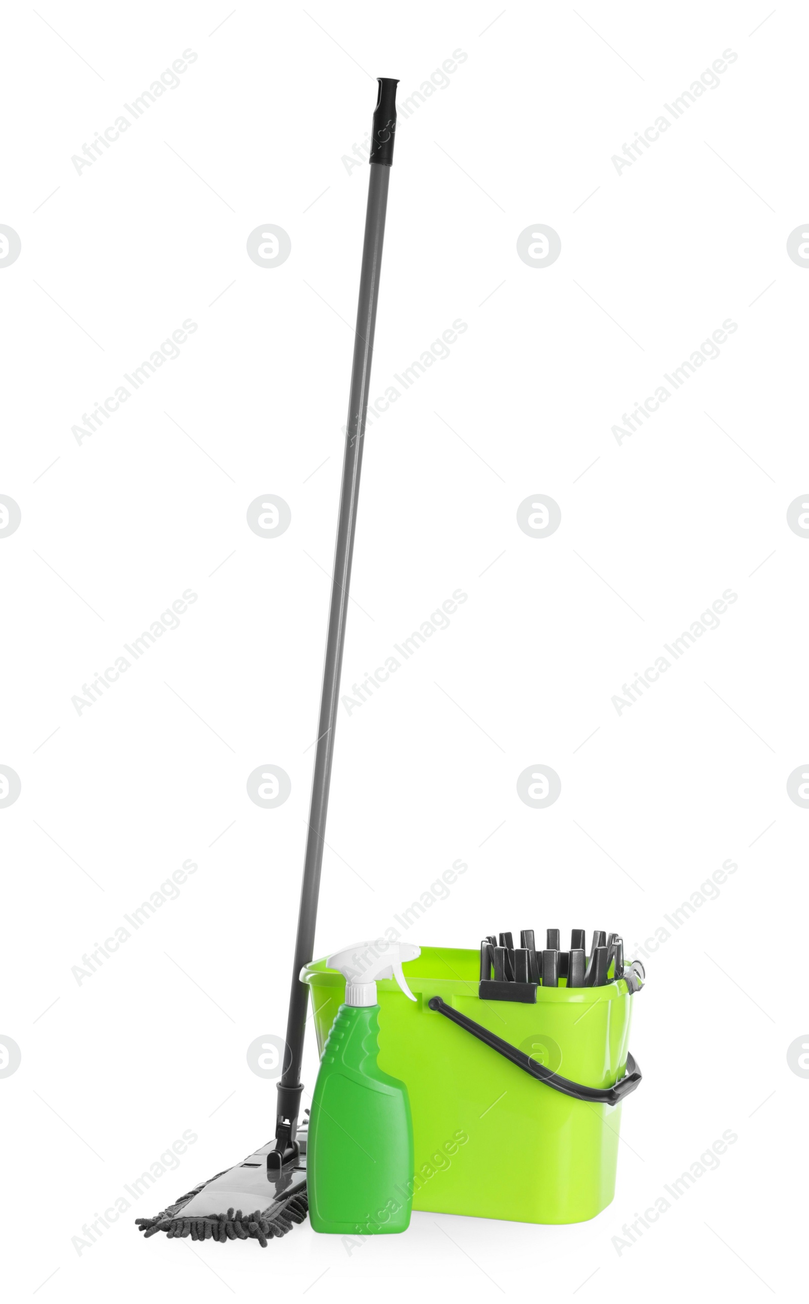 Photo of Mop, detergent and plastic bucket on white background. Cleaning supplies