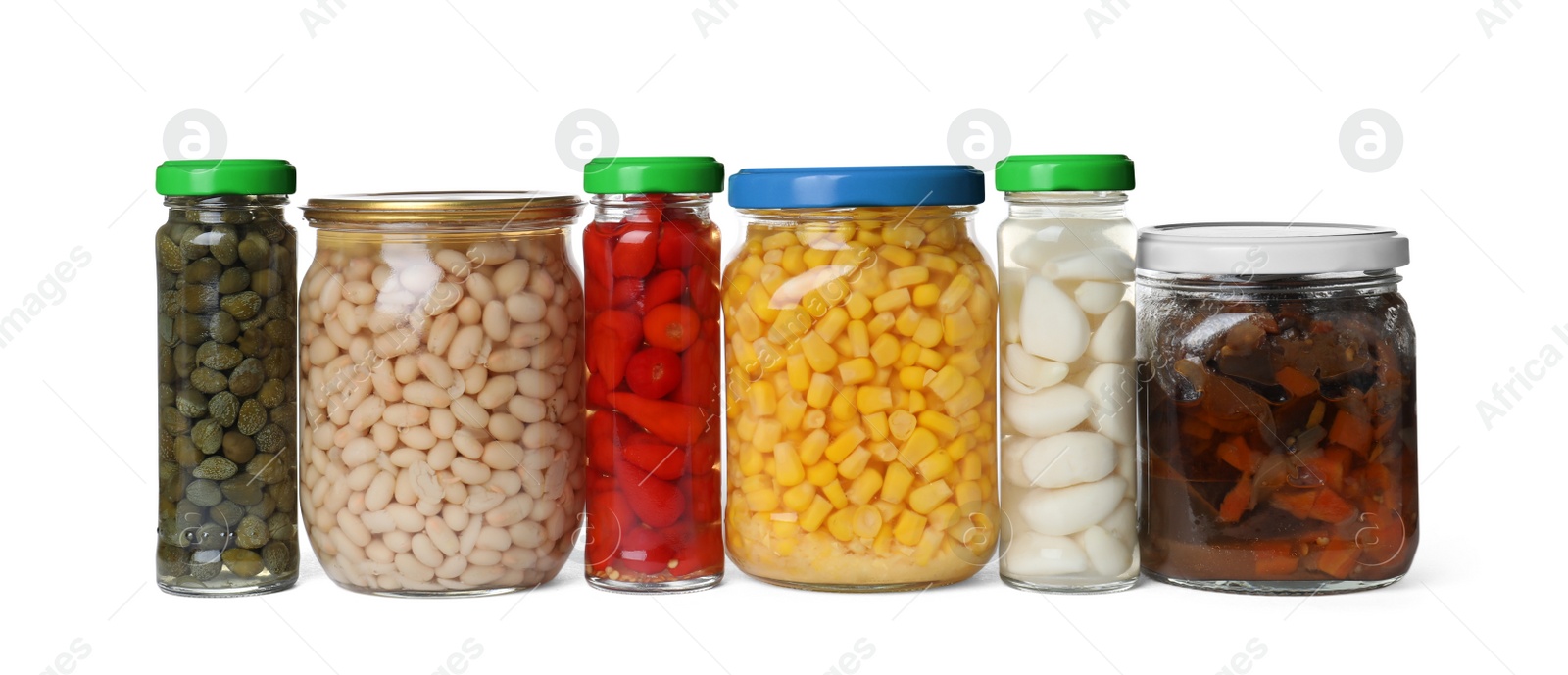 Photo of Different jars with pickled vegetables on white background