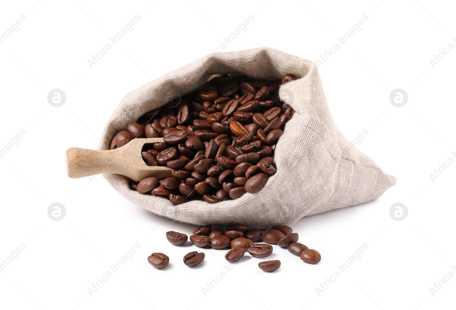 Photo of Bag and wooden scoop with roasted coffee beans isolated on white