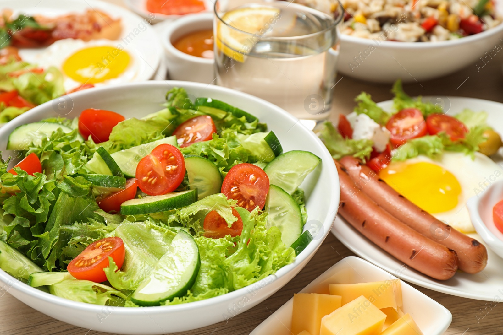 Photo of Different delicious dishes on table, closeup. Buffet service