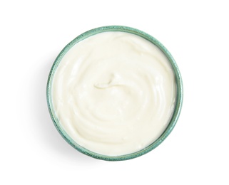 Bowl with creamy yogurt on white background, top view