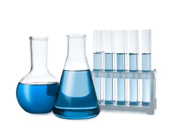 Image of Laboratory glassware with blue liquid isolated on white