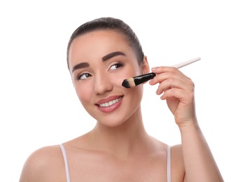 Photo of Woman with makeup brush on white background