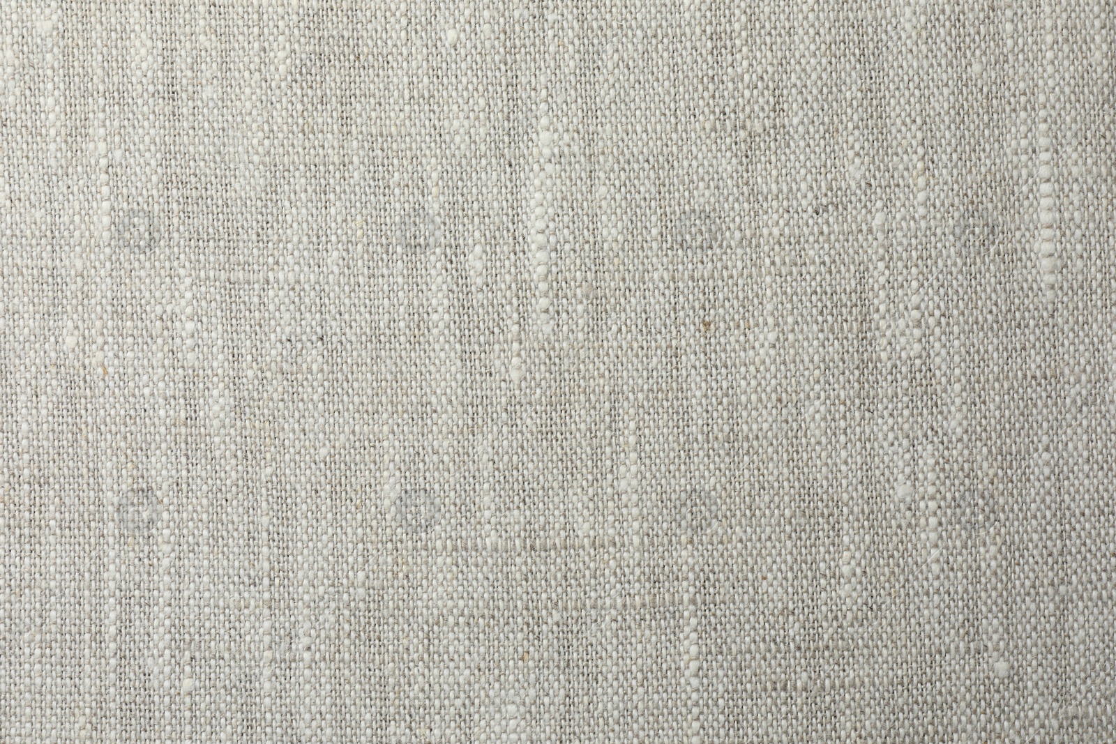 Photo of Texture of light grey fabric as background, top view