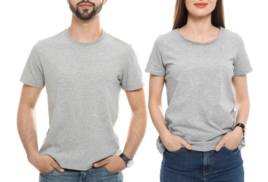 Photo of Young people in t-shirts on white background, closeup. Mock up for design