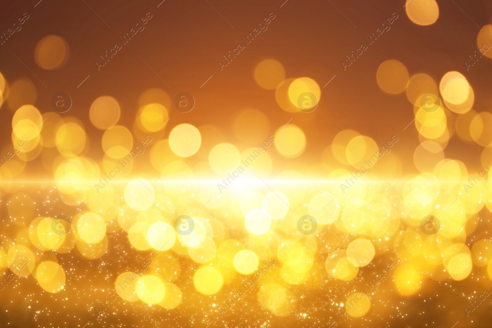 Image of Beautiful abstract background with defocused golden lights