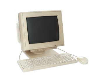 Old computer monitor, keyboard and mouse on white background