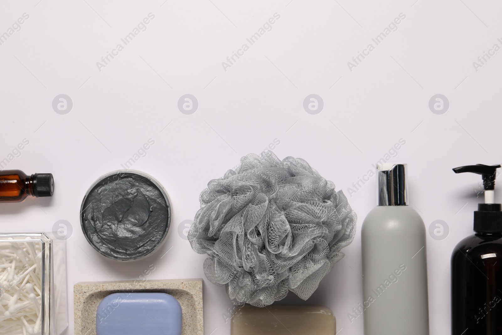 Photo of Bath accessories. Different personal care products on white background, flat lay with space for text