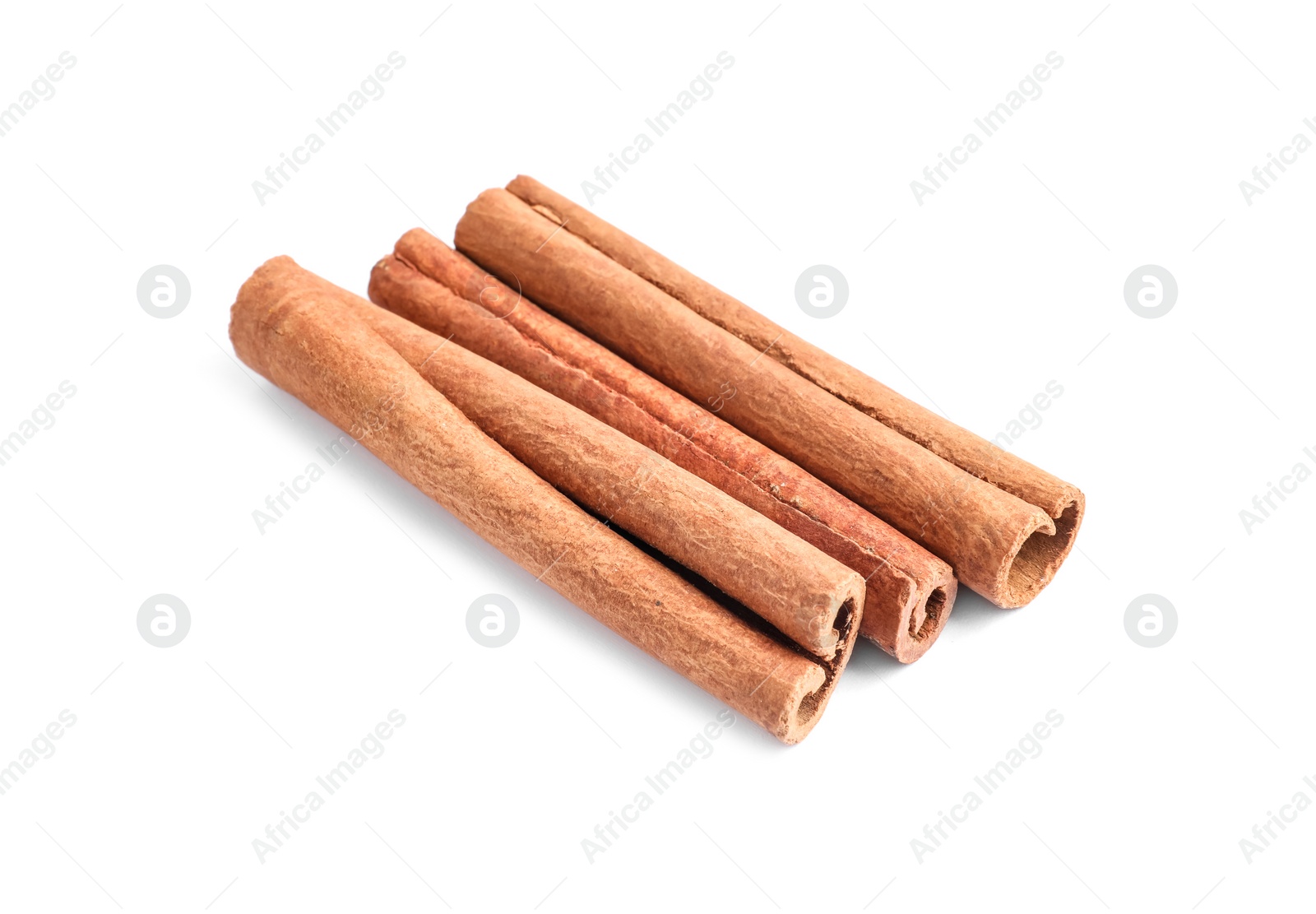 Photo of Three aromatic cinnamon sticks isolated on white