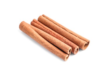 Photo of Three aromatic cinnamon sticks isolated on white