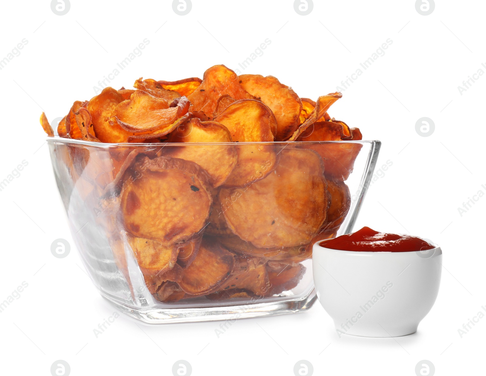 Photo of Bowl of sweet potato chips with sauce isolated on white