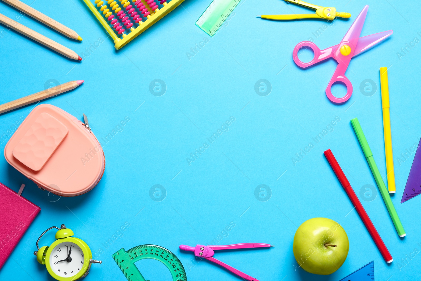 Photo of Flat lay composition with stationery on blue background, space for text. Teacher's day