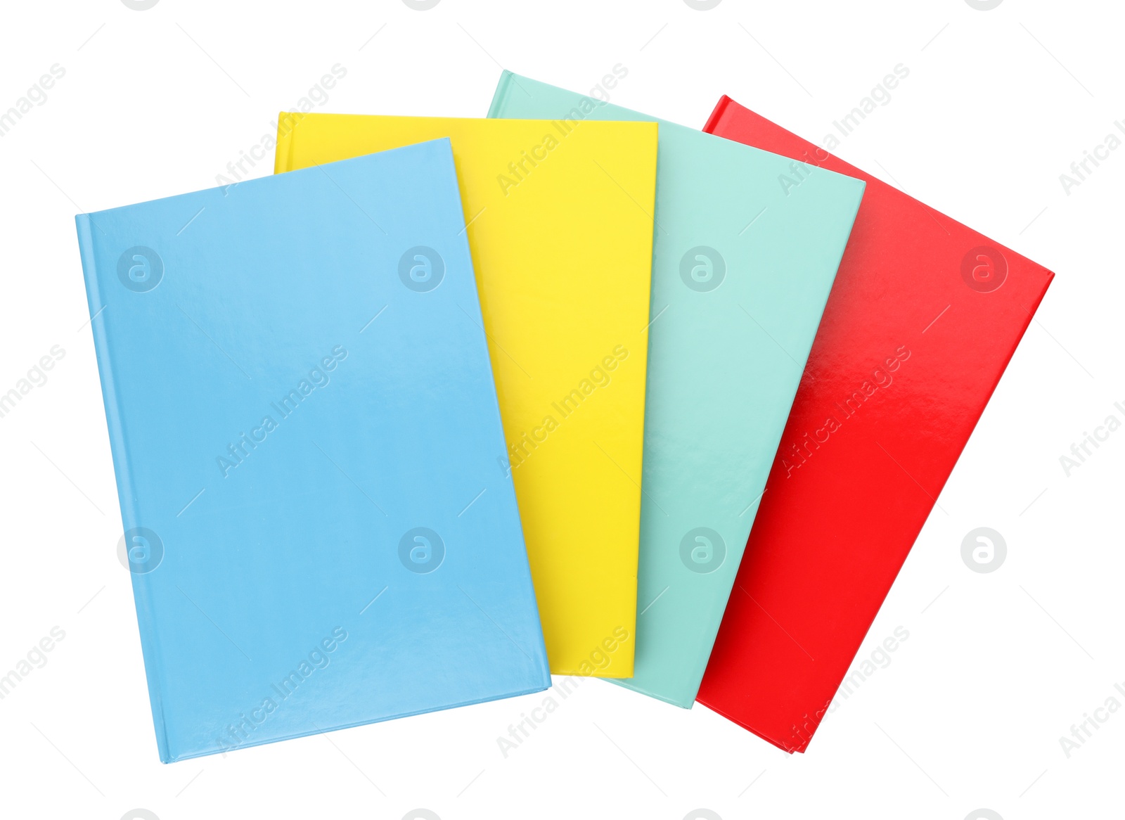 Photo of Different colorful hardcover planners on white background, top view