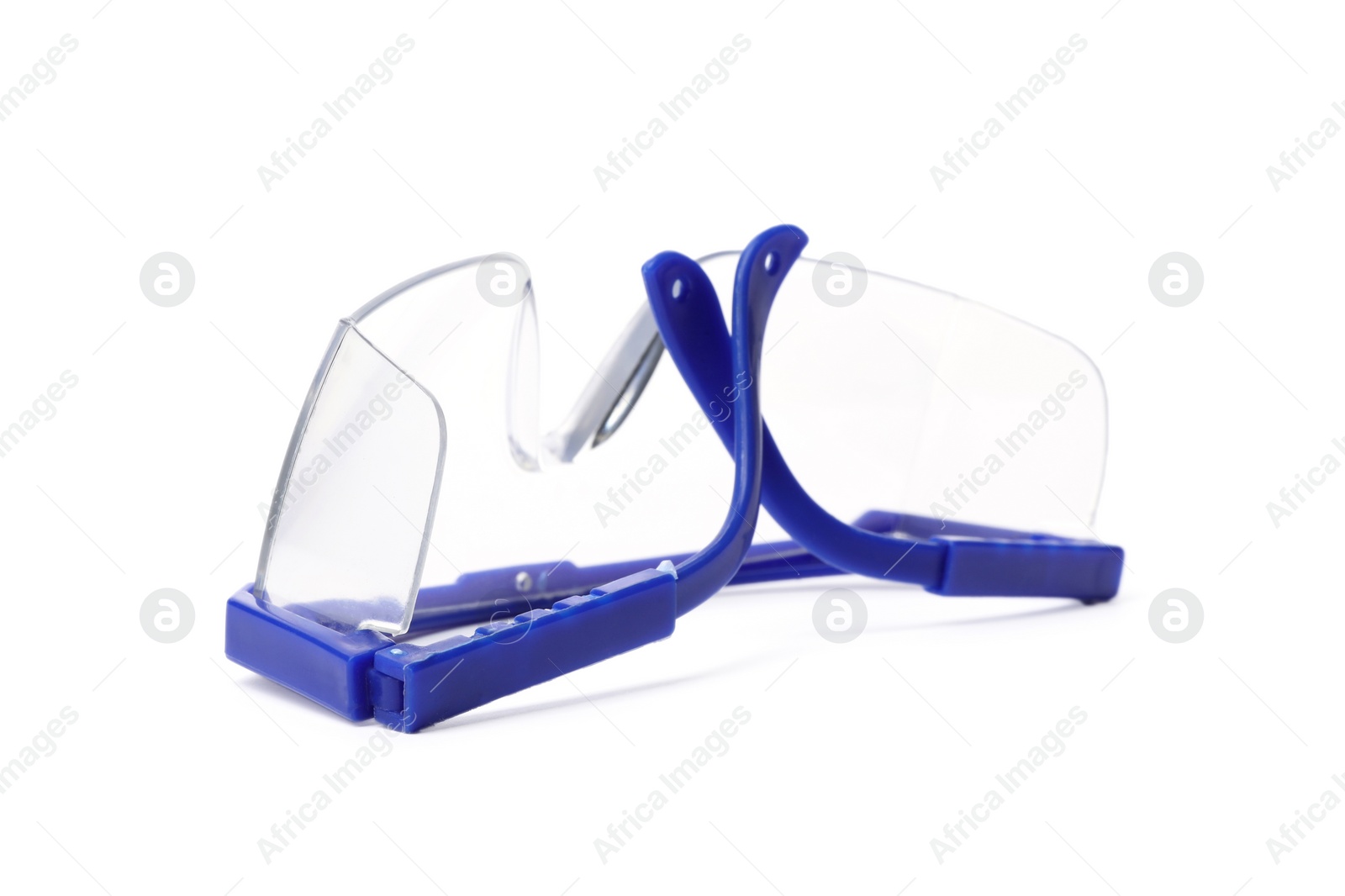 Photo of Protective goggles on white background. Construction tool