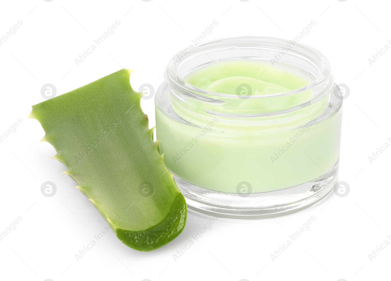 Photo of Jar of cosmetic cream and cut aloe leaf isolated on white