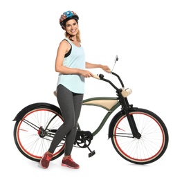 Photo of Portrait of sporty woman with bicycle on white background