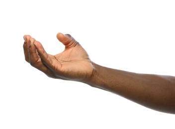 African-American man holding something in hand on white background, closeup