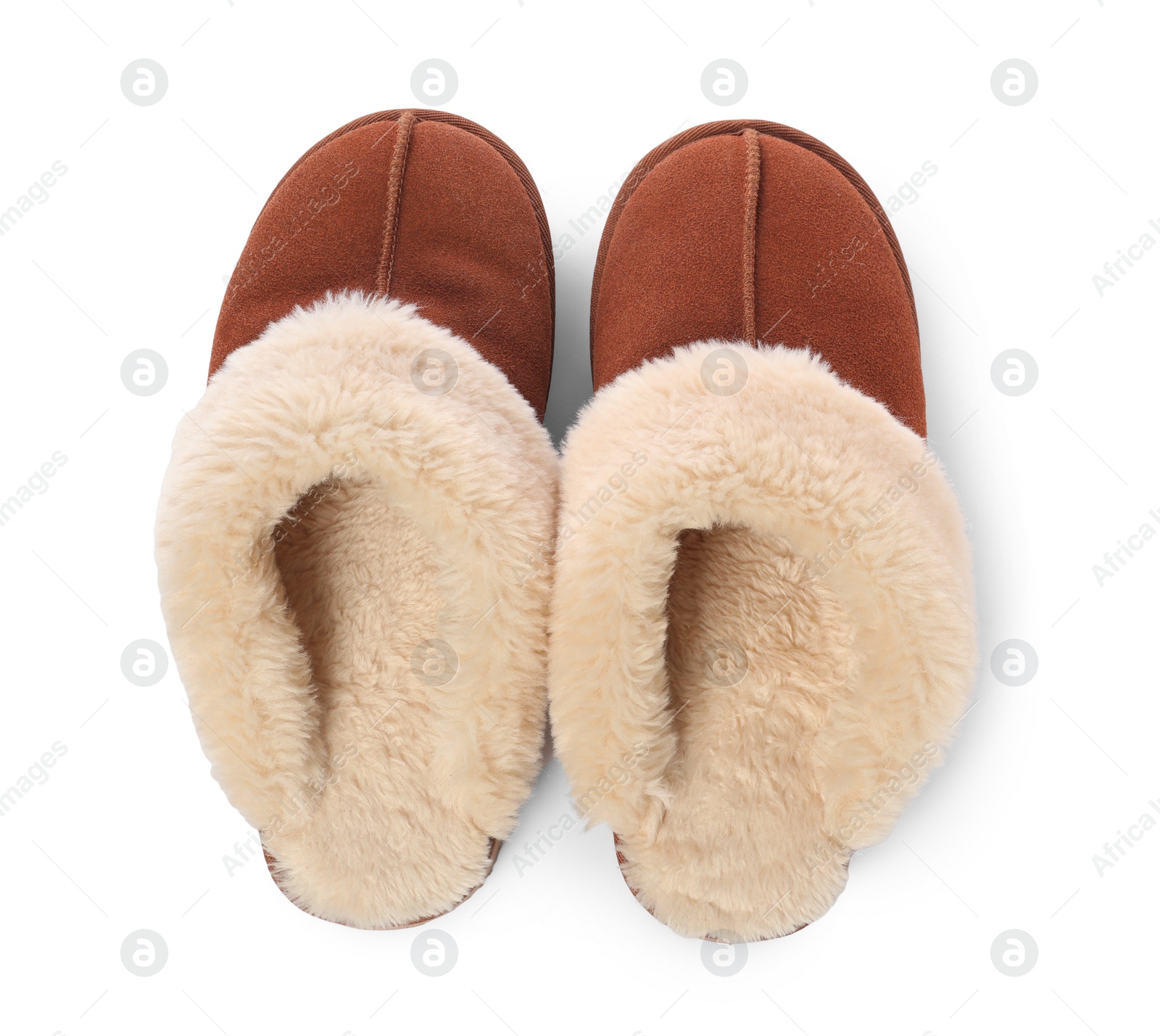 Photo of Pair of soft slippers with fur isolated on white, top view