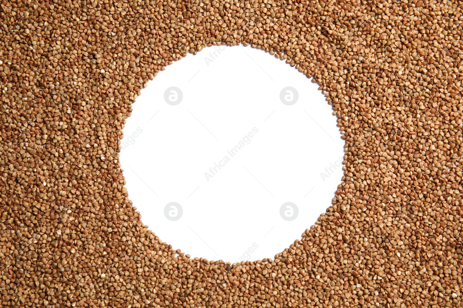 Photo of Uncooked buckwheat and space for text on white background, top view