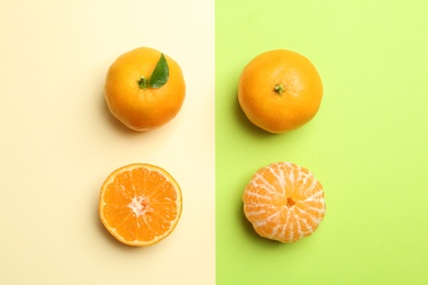 Photo of Flat lay composition with fresh juicy tangerines on color background