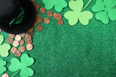 Photo of Flat lay composition with clover leaves on green background, space for text. St. Patrick's Day celebration