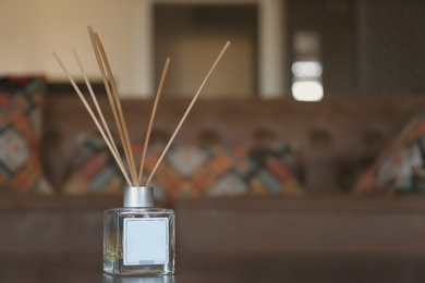 Reed air freshener on table in room