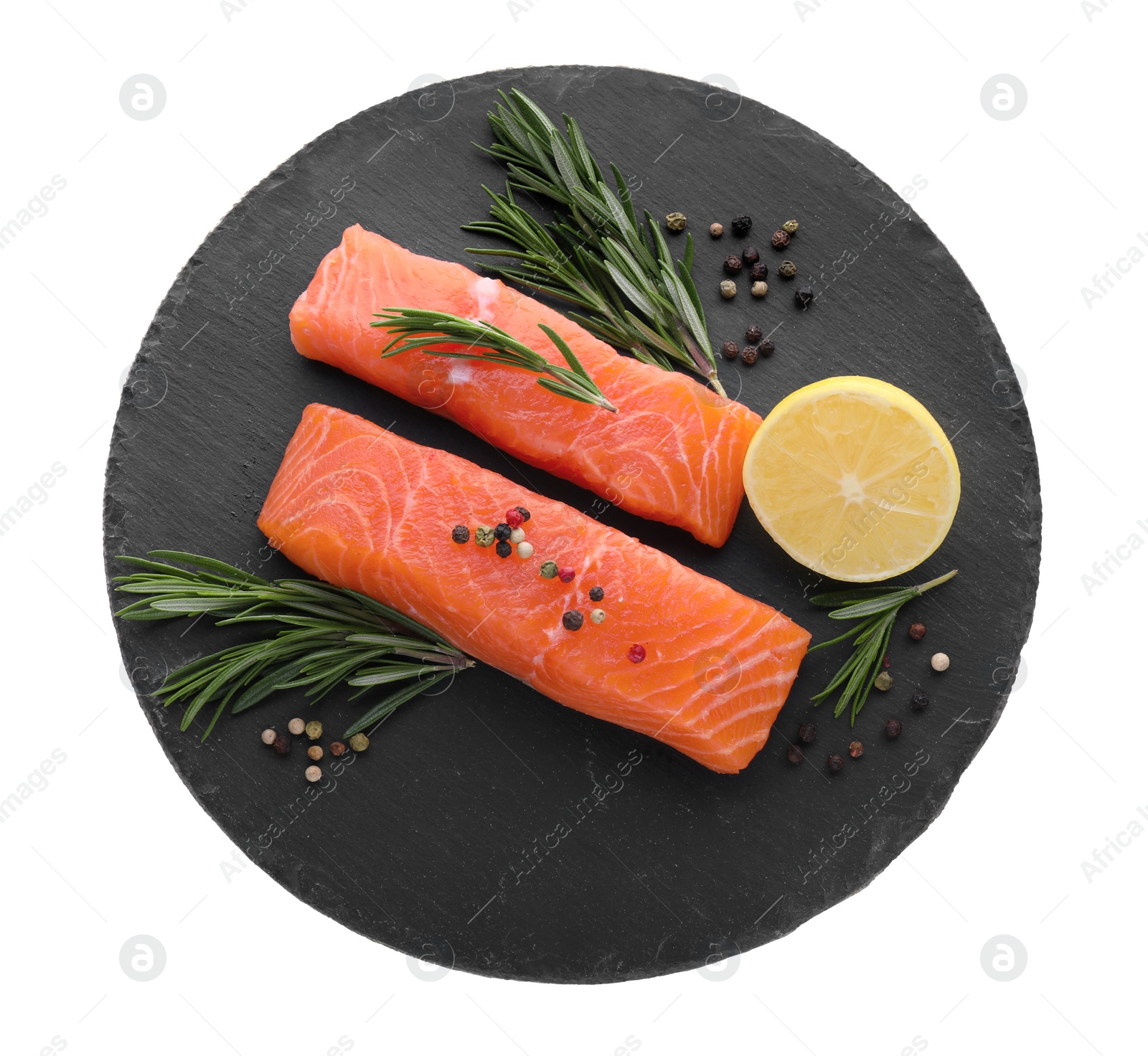 Photo of Pieces of fresh raw salmon, spices and lemon on white background, top view