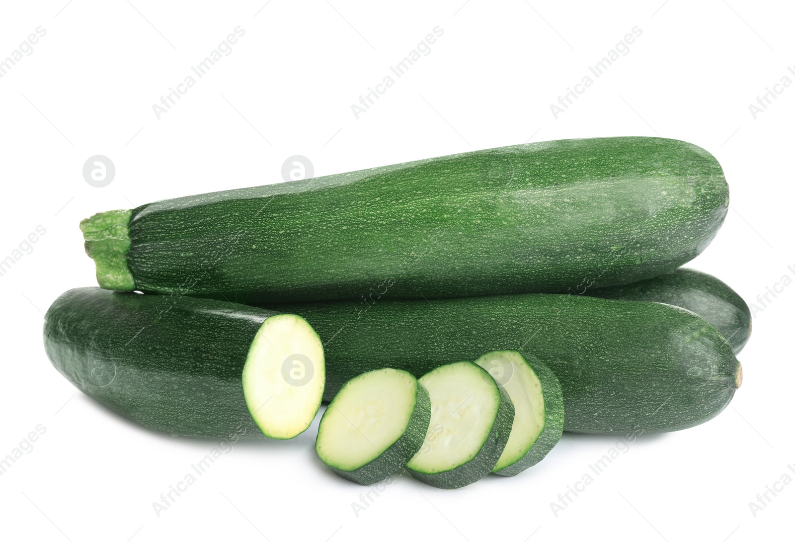 Photo of Fresh ripe green zucchinis isolated on white