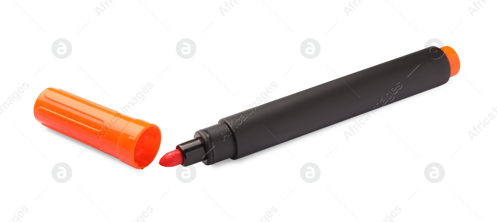 Photo of Bright orange marker isolated on white. School stationery