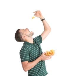 Photo of Man eating potato chips on white background