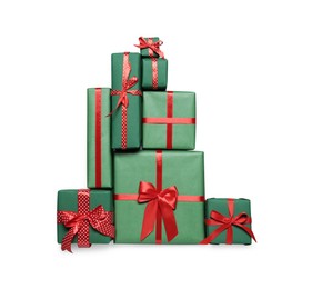 Christmas tree shape of gift boxes on light grey background, flat lay